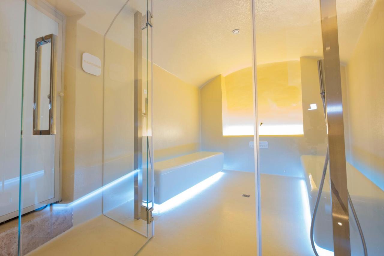 Aquatio Cave Luxury Hotel&SPA Matera Esterno foto A shower room